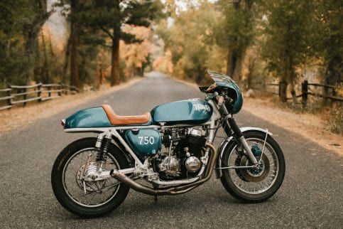 A green Honda CB750K cafe racer